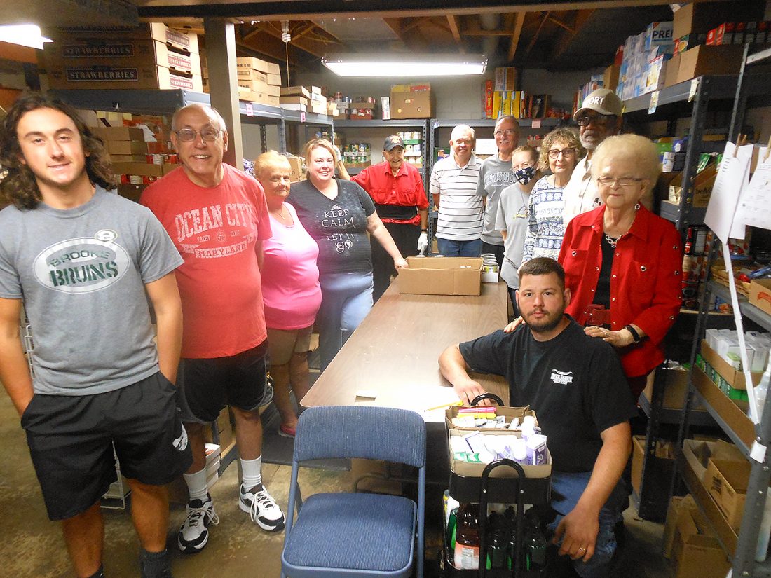 Food distributions resume at Community Bread Basket News, Sports